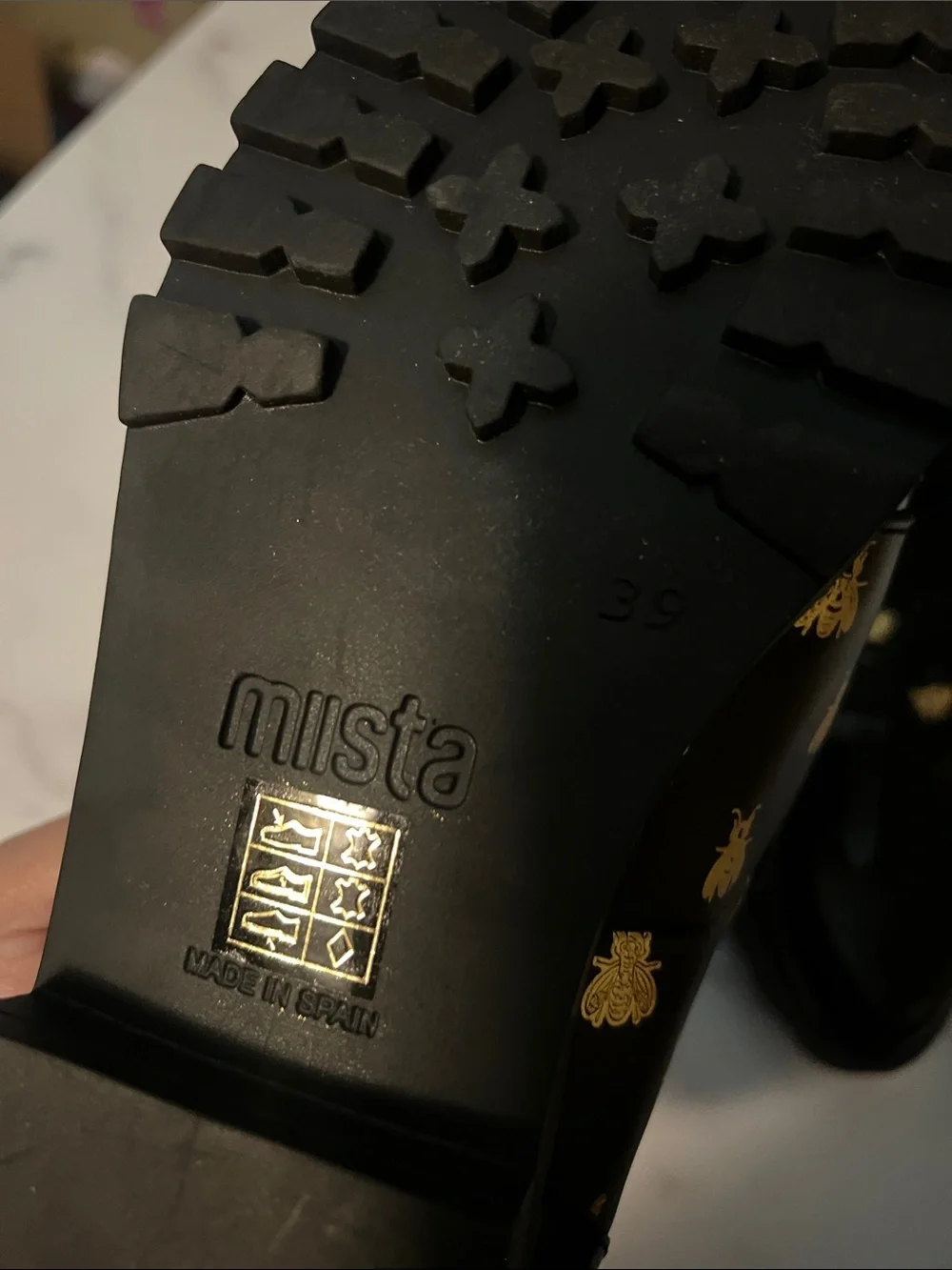 Miista Black Leather Bee-Print Kiltie Loafers